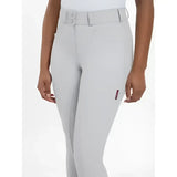 Light grey imogen knee grip breeches with form fitting design, sleek belt loops, and subtle thigh branding