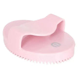 Pink silicone imperial riding curry comb soft with rounded handle and serrated edge for gentle pet grooming