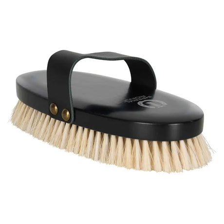 Black imperial riding soft brush with light beige bristles and black leather handle with brass rivets seen from back side