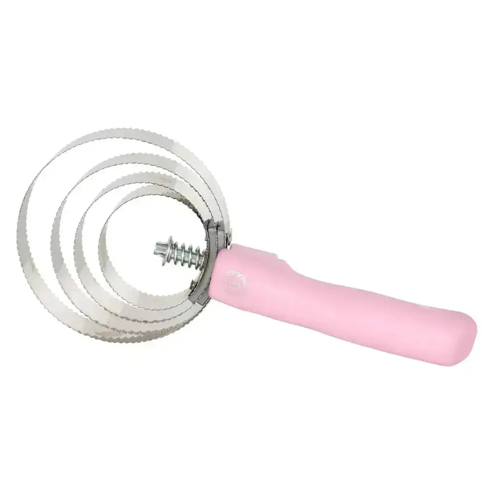 Pink-handled metal cake ring cutter with three adjustable circular blades for imperial riding spring comb use
