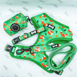 Green fox-themed dog harness set with inquisitive fox poo bag holder and matching leash in vibrant green color
