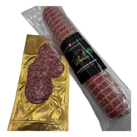 A packaged italian milano salami roll with black label and gold foil packaging perfect for snacking