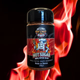 A vibrant red and black jar of jim slinn hot sugar bbq spice rub with a cartoon chef for jim slim barbecue seasonings