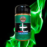 Jar of jim slim barbecue this ain t texas dry rub seasoning with green and black label and black lid from slim barbecue seasonings