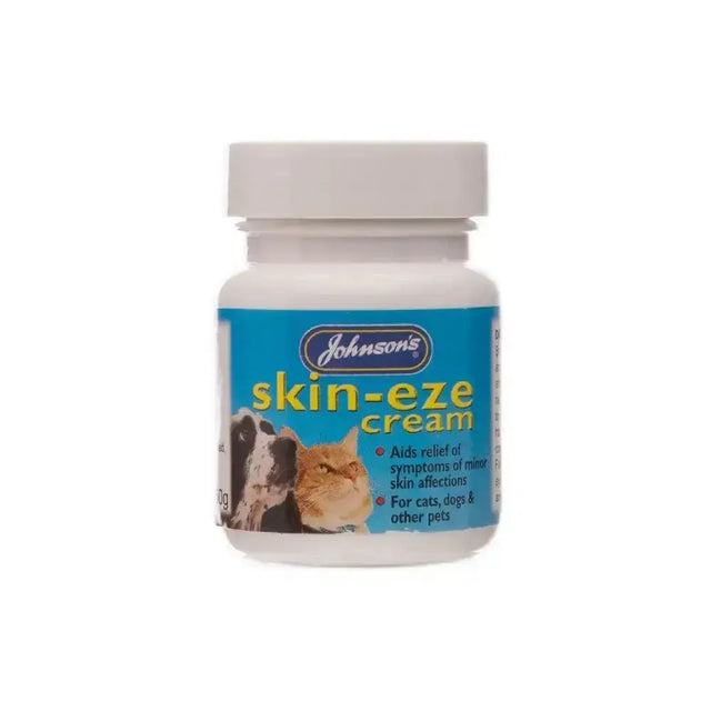 Johnson’s veterinary skin eze cream in a white plastic bottle with a blue label showing cats and dogs uses traditional soothing sulphur
