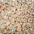 A mix of light tan brown and white seeds in jeff euro depurative pigeon mix 20 kg for healthy birds