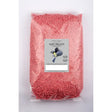 A clear plastic bag of pink jeff suet pellets with berries labeled suet pellets by johnston and jeffs 4 kg