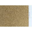 A dense layer of light brown tiny round budgie seed with a slightly textured surface from johnston & jeff super 50