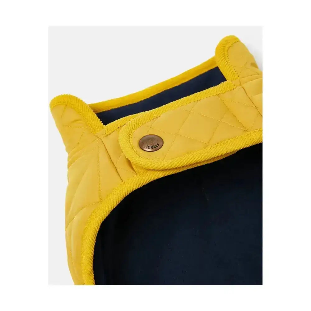 Bright yellow joules quilted dog coat with navy blue interior and diamond quilted padded design and brass button