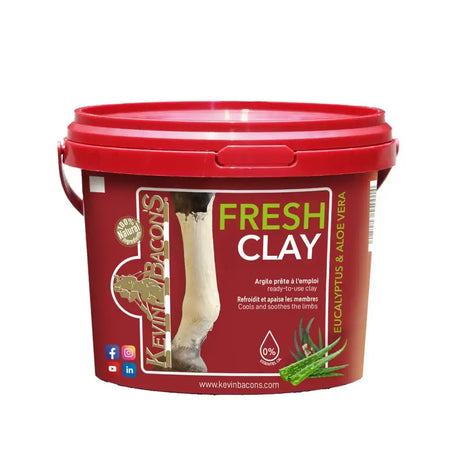 Red plastic bucket with matching lid labeled kevin bacons fresh clay featuring horse leg and eucalyptus aloe vera illustrations
