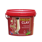 Red plastic bucket with matching lid labeled fresh clay by kevin bacons featuring a horse leg and eucalyptus aloe vera illustrations