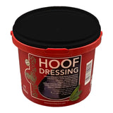 Red plastic bucket with black lid labeled hoof dressing by kevin bacon’s for hoof dressing black use