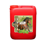 Red plastic jug of kevin bacons lucy diamond shampoo 2-in-1 shampoo and conditioner for horses