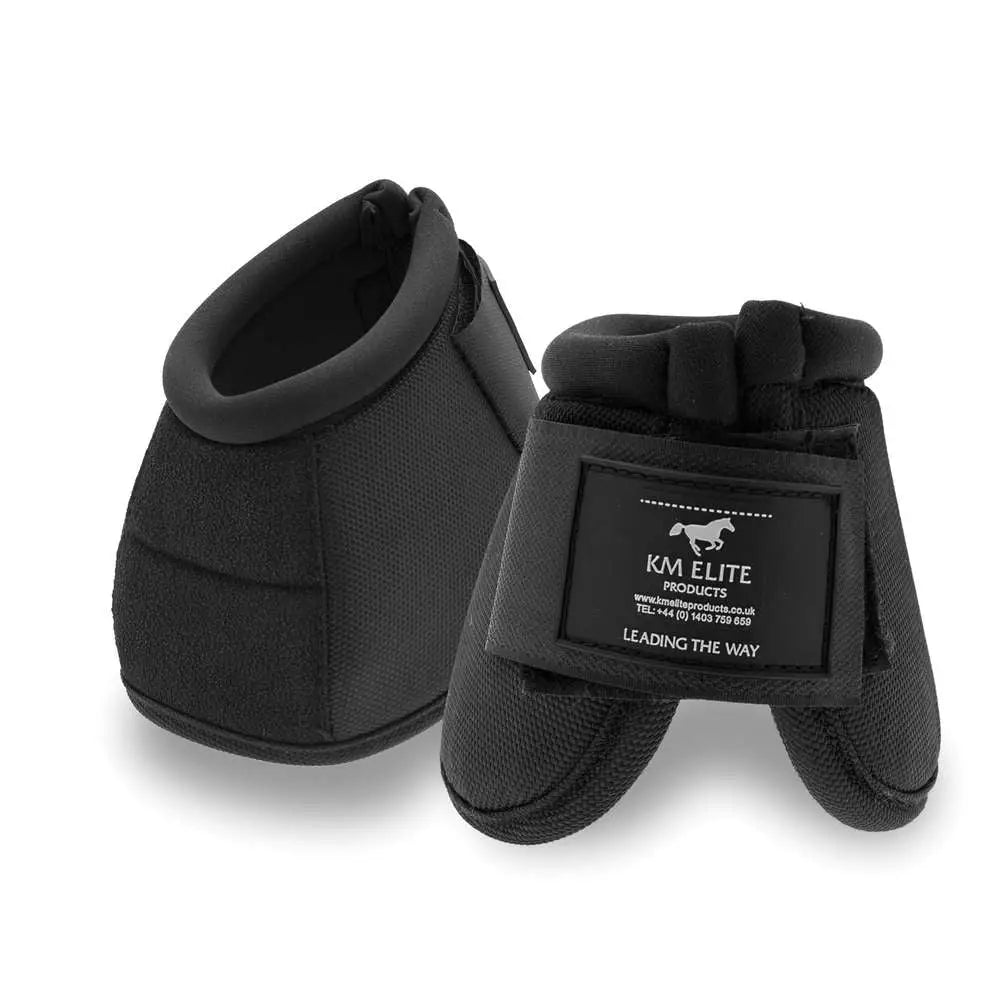 Black km elite ballistic no-turn over-reach boots with padded textured fabric and velcro strap closure