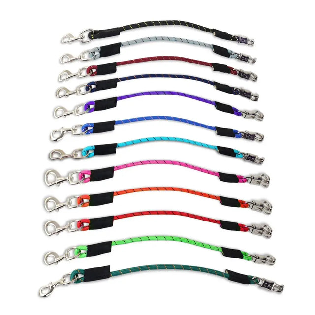 A colorful set of km elite bungee tie braided leash extensions with silver quick-release panic snap clasps