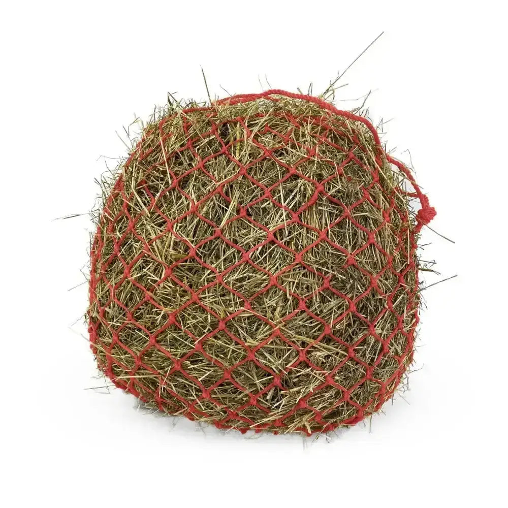Km elite deluxe haynet in red made of extra strong polyethylene filled with golden brown hay for durable haynets use
