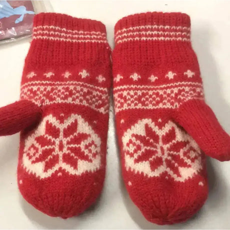 Knitted red mitts with cosy red and white yarn featuring a festive snowflake pattern on the palm perfect as riding gloves