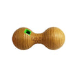 Tan ribbed kong bamboo feeder dumbbell dog toy with green rectangular opening for irresistibly unpredictable play