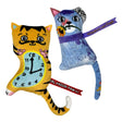 Yellow plush tiger-shaped clock with black stripes and light blue face featuring pink paws from kong cat artz miniature masterpieces inspired by starry night