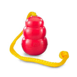 Red kong classic dog toy with yellow rope handle made of durable rubber gold standard for dog toys