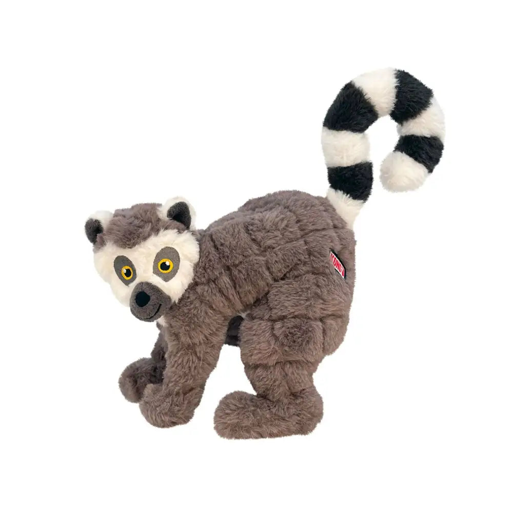A kong scampers lemur plush dog toy with a gray quilted body low-tone squeaker and black and white striped tail