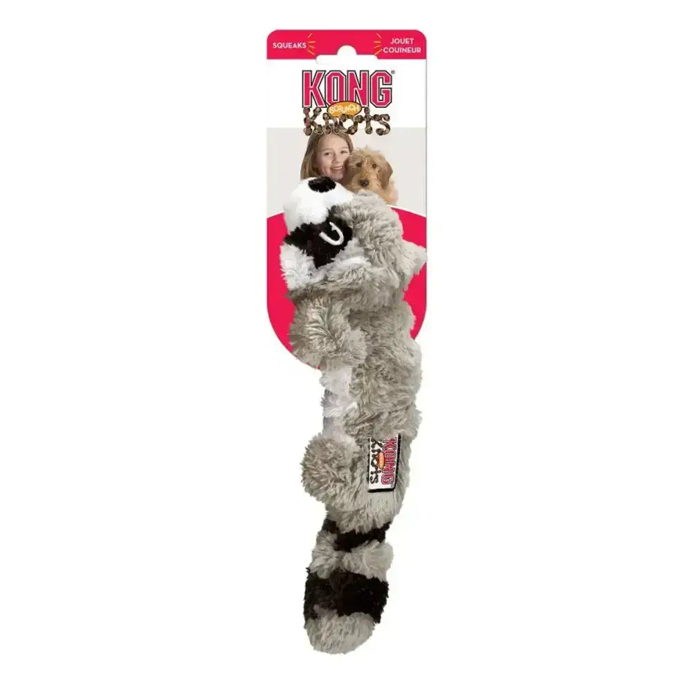 A plush kong scrunch knots raccoon dog toy in gray and black with soft texture and striped tail for playful pups