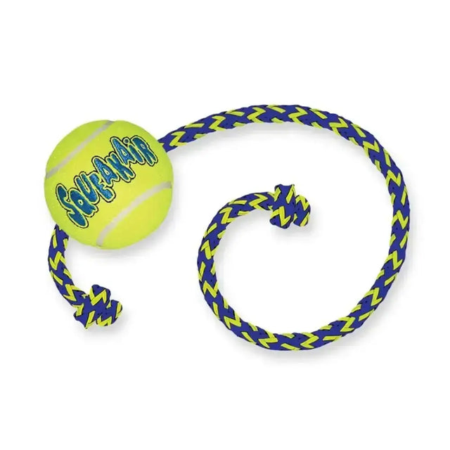 Bright yellow kong squeakair ball dog toy with blue logo attached to navy and neon green zigzag rope