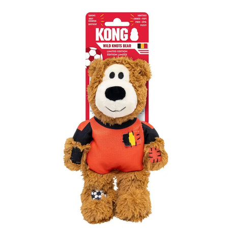 A plush brown kong wild knots sport bel bear wearing an orange and black soccer jersey with a belgian flag patch
