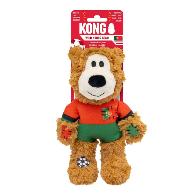 A plush tan kong wild knots bear portugal wearing an orange green soccer jersey with internal knotted rope inside