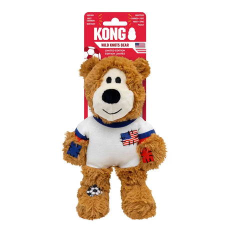 Brown plush kong wild knots sport usa bear with internal knotted rope wearing white soccer jersey with patches