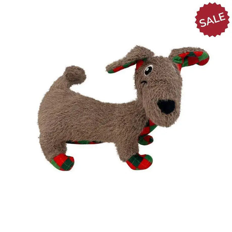A plush brown kong xmas pupsqueaks tucker medium dachshund toy with red and green plaid accents on ears paws and tail