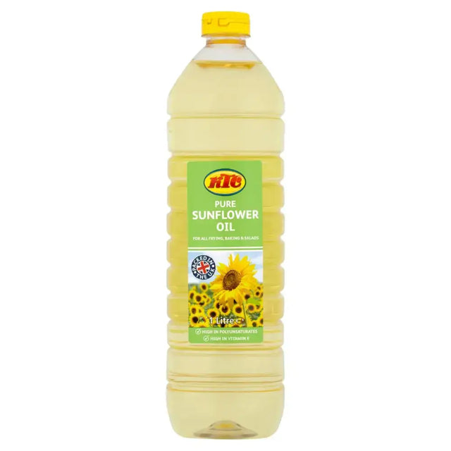 A clear plastic bottle of ktc sunflower oil 1ltr with yellow cap and green sunflower label filled with golden oil