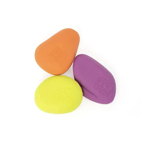 Set of three colorful silicone kurgo skipping stones in orange purple and lime green smooth floating skipping stones