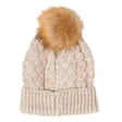 Beige ladies cable knitted pom pom hat with warm cable knitted texture and fluffy tan pom pom on top