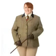 A woman wearing a khaki ladies launton deluxe tweed riding jacket with black collar and beige riding pants