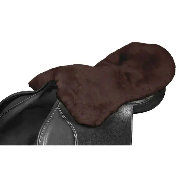 Brown lambswool seat saver mocha with soft plush texture and streamlined shaping on black leather horse saddle