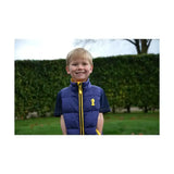 Blue quilted lancelot padded gilet by little knight with yellow zipper cut specifically for lightweight warmth