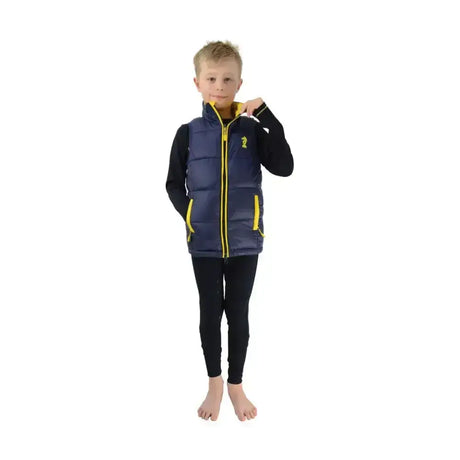 Navy blue lancelot padded gilet by little knight with yellow zipper and trim cut specifically for lightweight warmth
