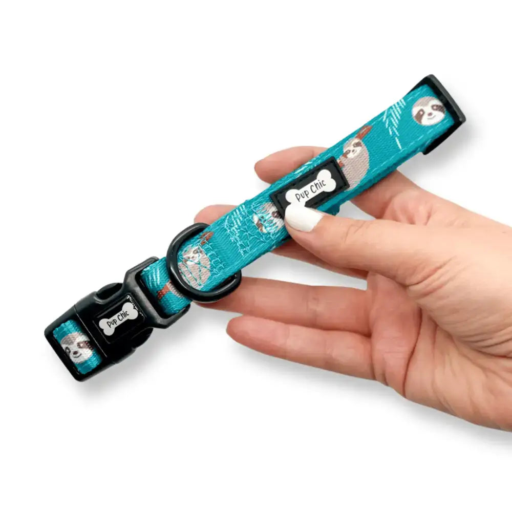 Teal lazy sloth collar with playful sloth pattern black plastic buckle and mint green pup chic label for dogs