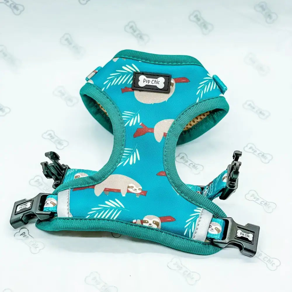 Teal lazy sloth puppy harness xxs with playful sloth palm leaf pattern black buckles and green reinforced trim