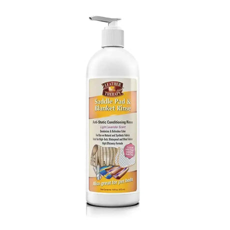 White plastic bottle with pump dispenser labeled leather therapy saddle pad and blanket rinse for therapy saddle pad care