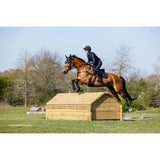A chestnut horse with black tack and rider in dark gear jumps using lemieux 3d mesh eurojump square navy for maximum airflow
