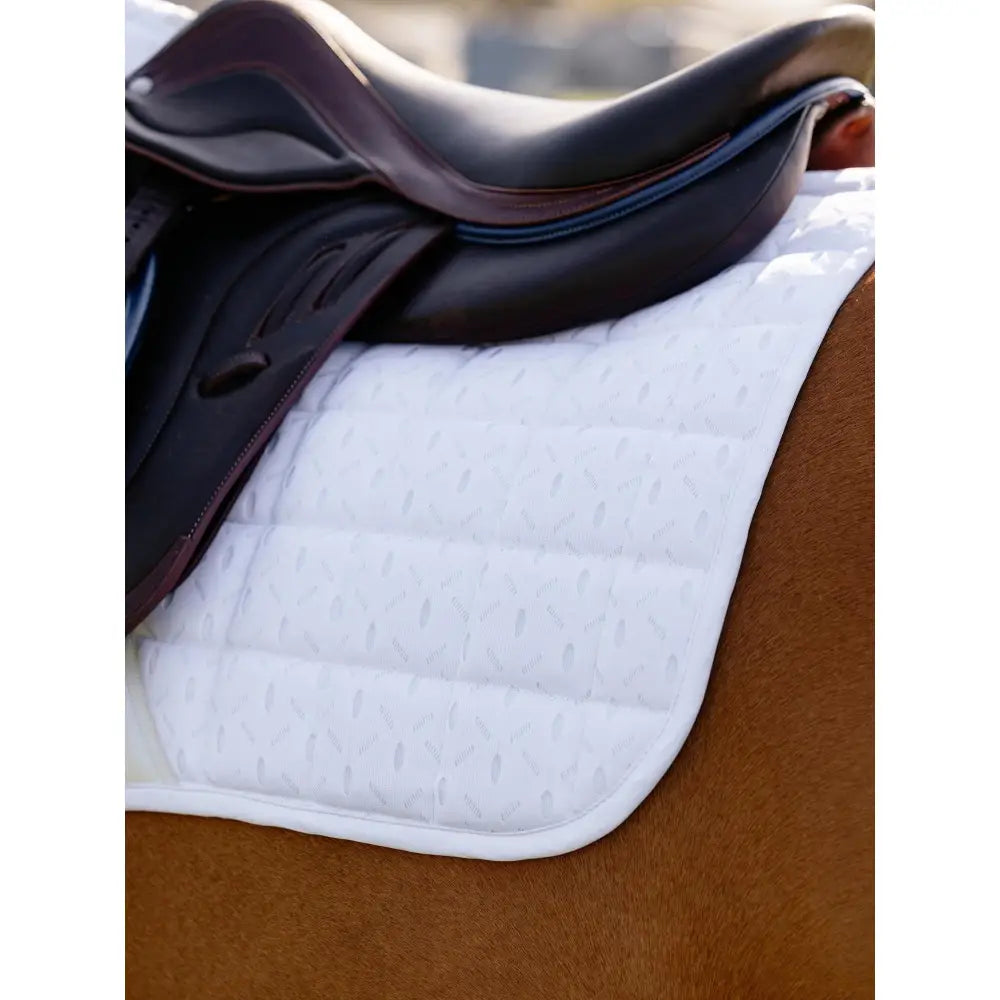 White quilted lemieux 3d mesh eurojump square white saddle pad with smooth padded surface and stitched fabric weave edges