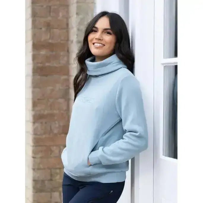 A soft light blue lemieux adele funnel neck sweat glacier with subtle embroidered logo on the chest