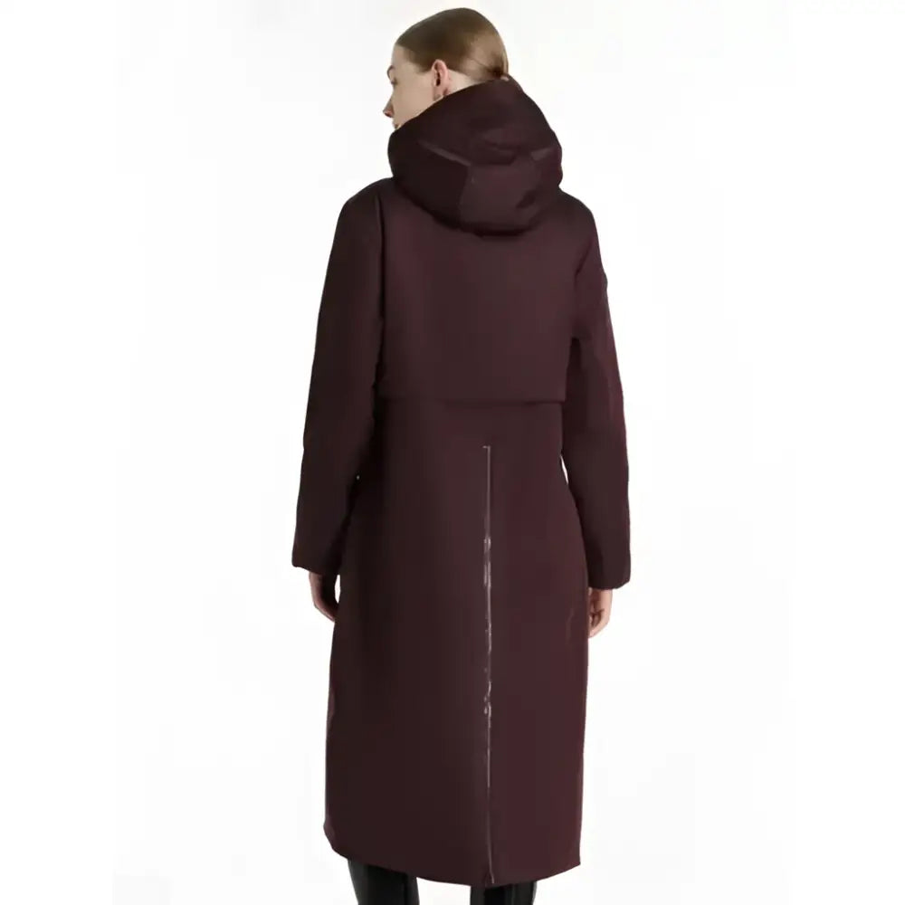 Back view of a burgundy lemieux elements robe damson longline coat with a structured hood and central zipper