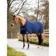 Navy blue quilted lemieux arika clima-tek rug with silver buckles and logo features multi-layered structure managing moisture