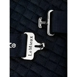 Silver-toned metal buckle with lemieux engraved on black strap of lemieux arika clima-tek rich navy rug with moisture control