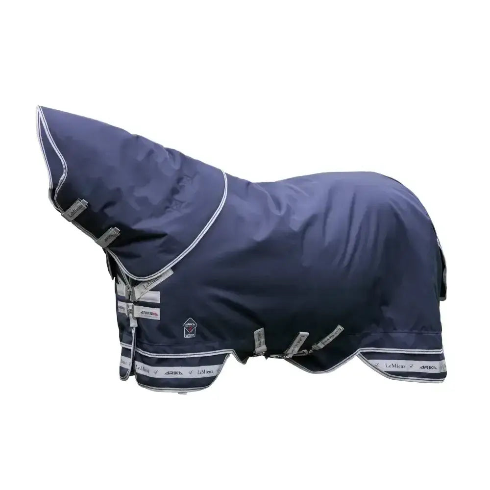 Navy blue lemieux arika featherweight rug with white trim silver buckles and hooded design for all weather protection