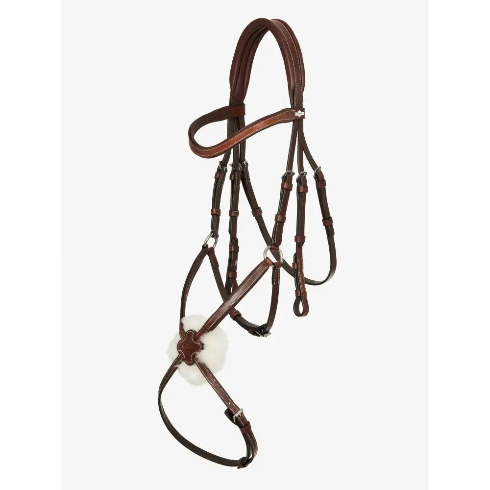 Brown leather arika grackle bridle lemieux havana silver with white fur noseband worn higher style