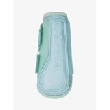 Light blue lemieux arika mesh brushing boots aqua with velcro straps and breathable mesh for hoof protection